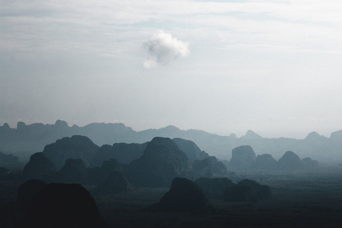One of my most popular images of a lone cloud over the mountains of Thailand